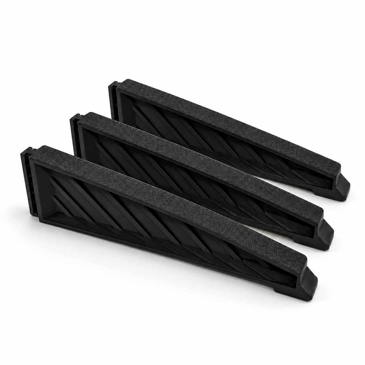 Three black medium Christmas tree stand replacement legs arranged on a white background