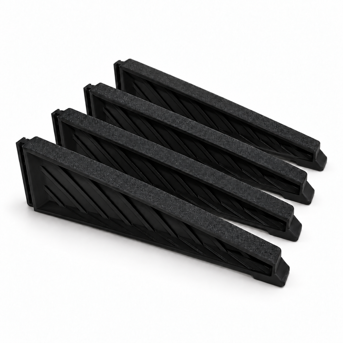 Four black medium Christmas tree stand replacement legs with ribbed sides on a white background