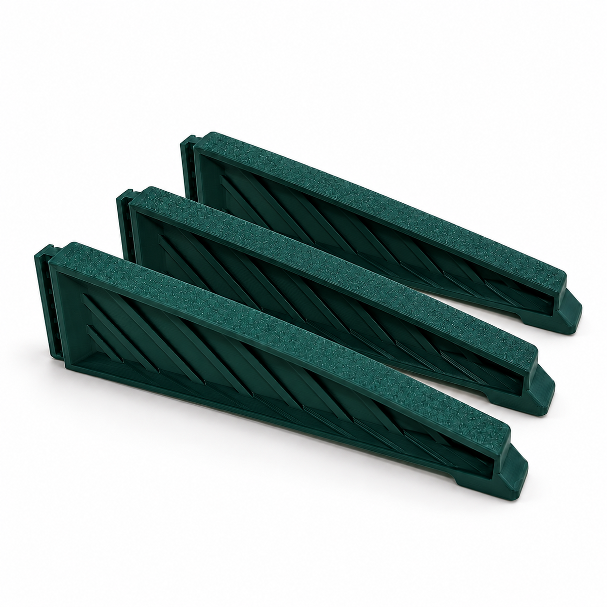 Three green medium Christmas tree stand replacement legs arranged on a white background